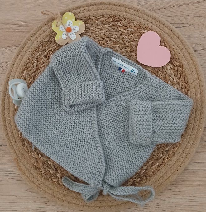 Ensemble brassière et petits chaussons en laine