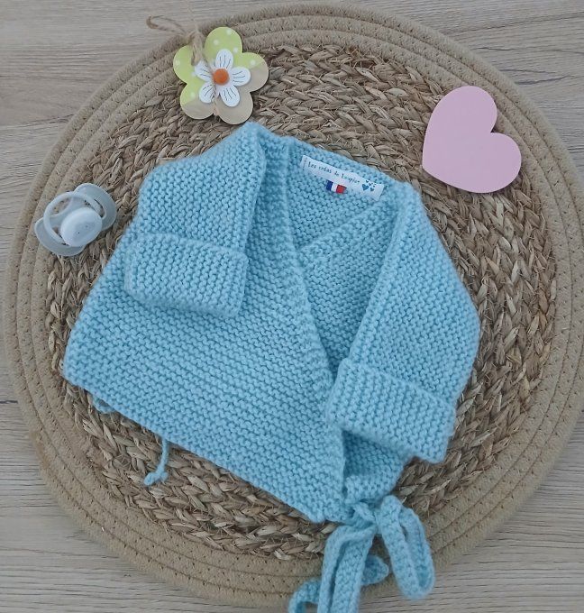 Ensemble brassière et petits chaussons en laine